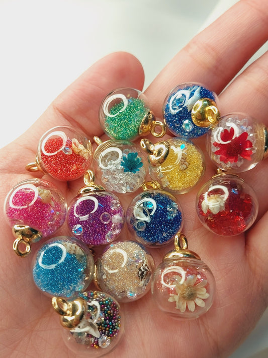 Imported Glass Globe Charms with dry flowers and sea shells