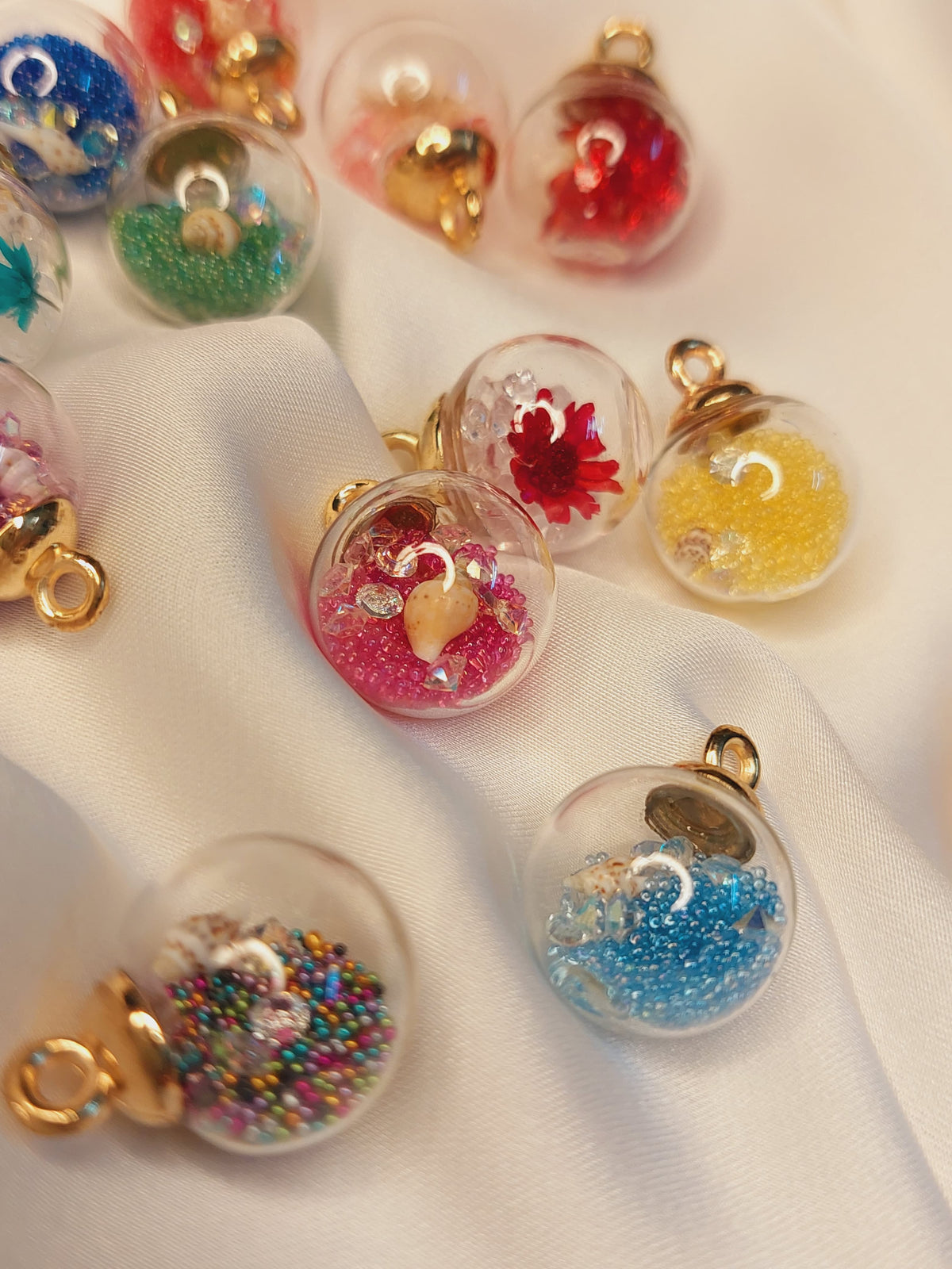 Imported Glass Globe Charms with dry flowers and sea shells