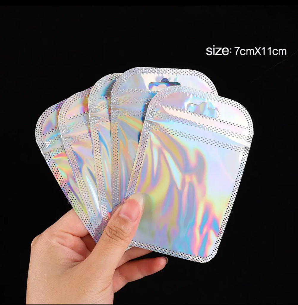 Holographic/ iridescent zip lock bags in Pink & Silver